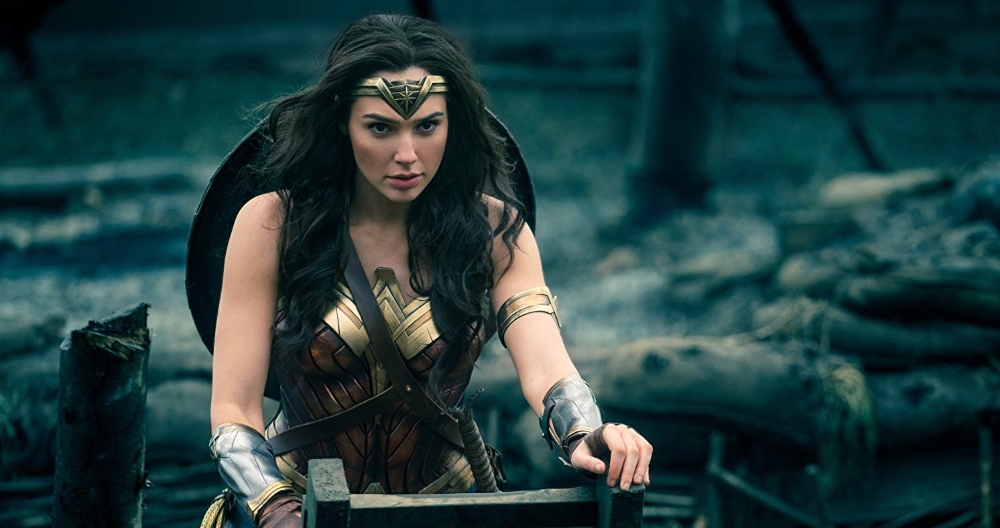 Diana climbing out of a trench into no man's land